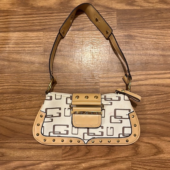Guess cream with tan and gold accents shoulder bag. (5”x10.5”) - Picture 1 of 5